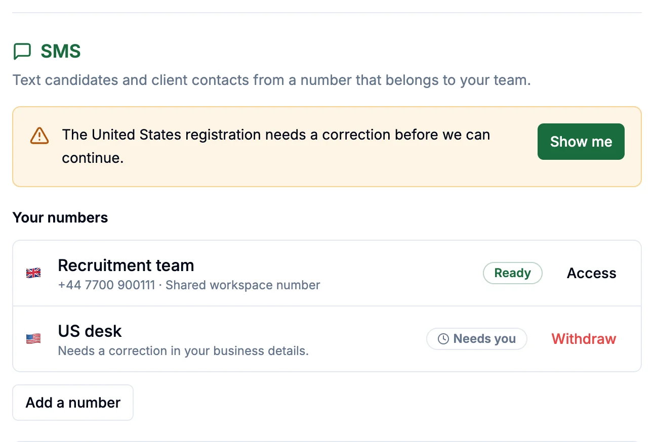 SMS settings asking for a correction to the US registration, with a Show me button